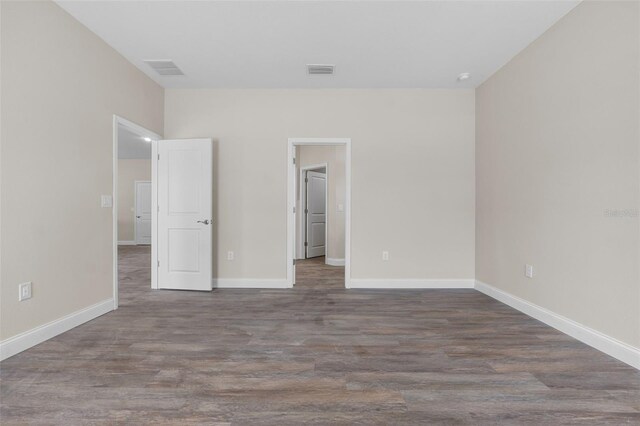 unfurnished bedroom featuring hardwood / wood-style floors