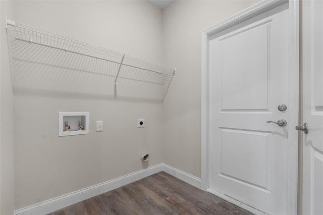 clothes washing area with washer hookup, dark wood-type flooring, electric dryer hookup, laundry area, and baseboards