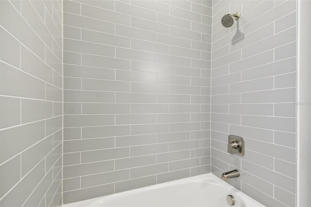 bathroom with shower / bathtub combination