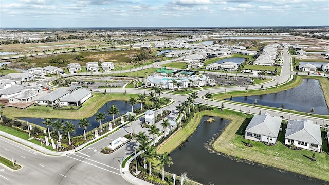 aerial view with a water view and a residential view