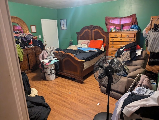 bedroom featuring wood-type flooring