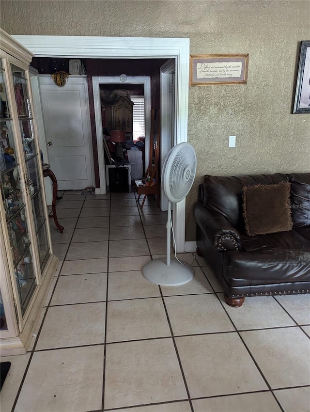 living room with tile patterned flooring