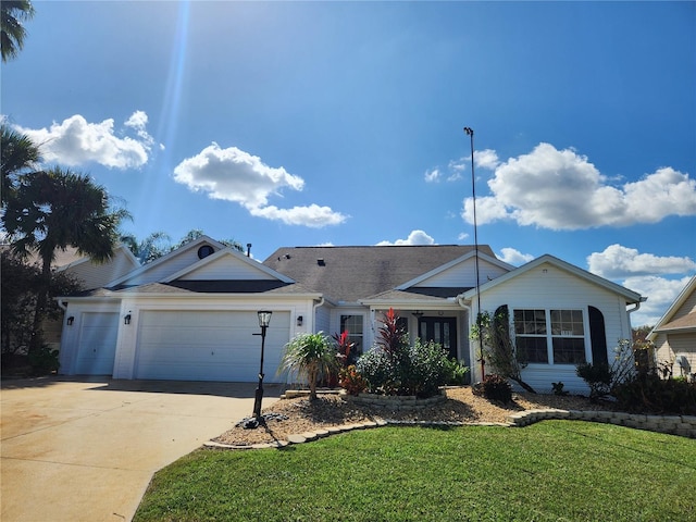 ranch-style house with a garage, concrete driveway, and a front lawn