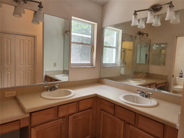 full bathroom featuring vanity, toilet, and plus walk in shower