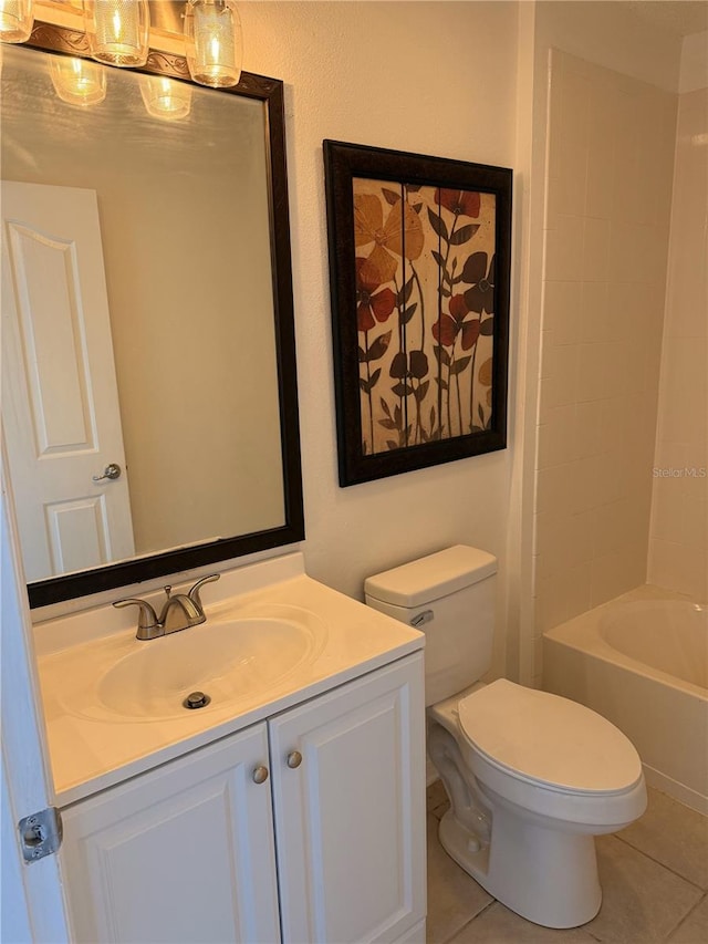 full bathroom with tile patterned floors, washtub / shower combination, vanity, and toilet