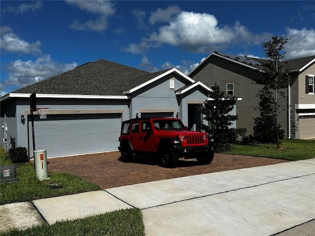 view of front of home with a garage