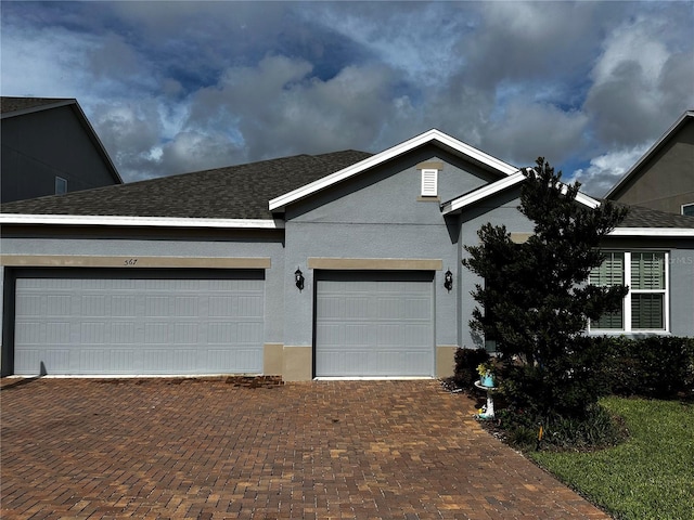 view of front of home featuring a garage