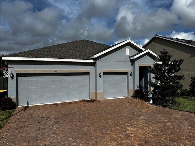 ranch-style home with a garage