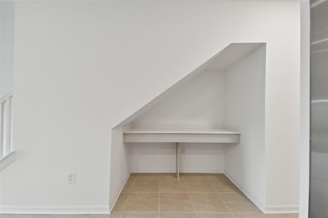 interior space with tile patterned floors