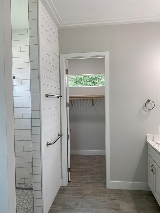 bathroom with vanity and hardwood / wood-style floors