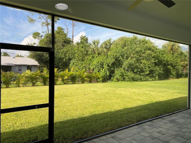 exterior space with a ceiling fan