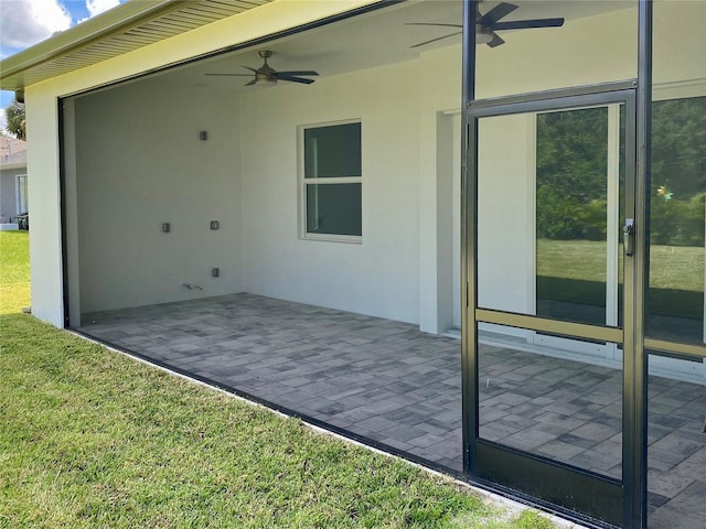 view of patio / terrace featuring a ceiling fan