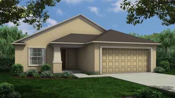 view of front of property featuring a garage and a front lawn