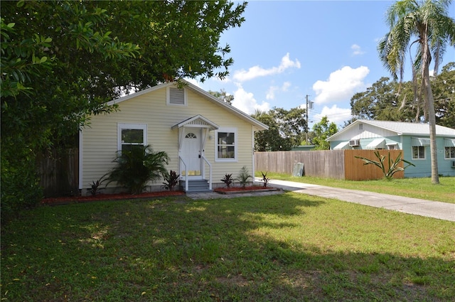 view of front of home with a front yard