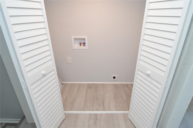 laundry room with washer hookup, hookup for an electric dryer, and light wood-type flooring