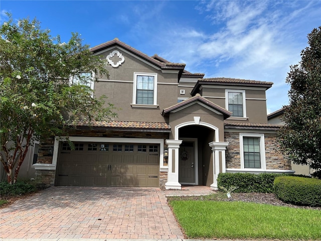 view of front of house with a garage