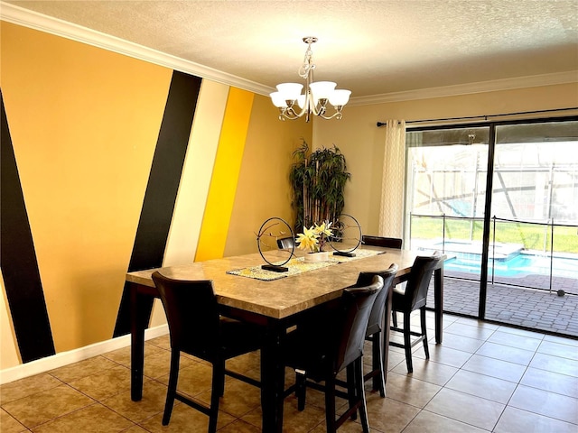 dining space featuring a chandelier, baseboards, a textured ceiling, and ornamental molding