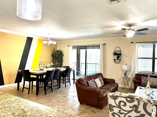 tiled living room featuring a textured ceiling, ceiling fan with notable chandelier, and crown molding