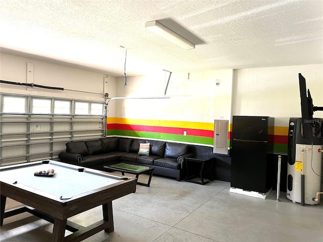 recreation room featuring electric panel, a textured ceiling, concrete block wall, water heater, and finished concrete floors