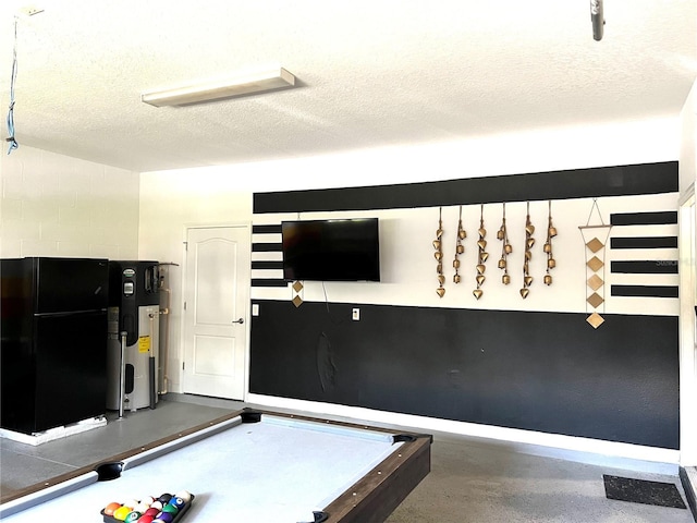 rec room featuring billiards, a textured ceiling, baseboards, and heat pump water heater