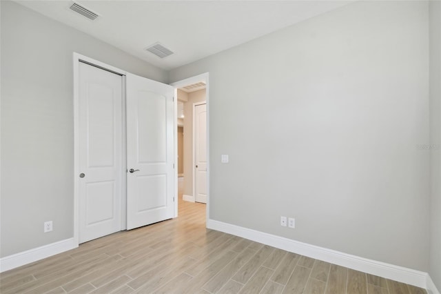 unfurnished bedroom with light hardwood / wood-style flooring