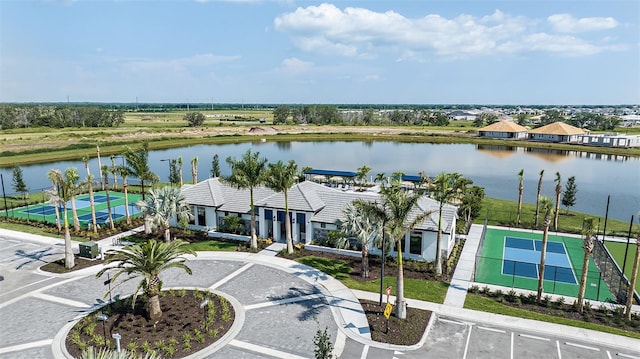 bird's eye view with a water view