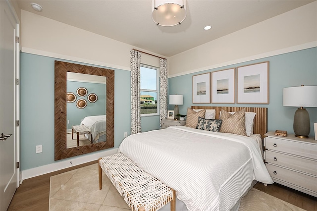 bedroom with wood-type flooring