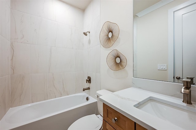 full bathroom featuring vanity, toilet, and tiled shower / bath combo