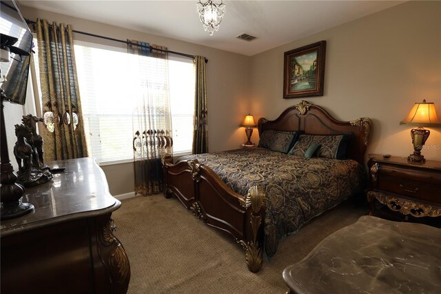 5002 Tideview Cir Unit 3, Orlando, FL 32819 - bedroom featuring visible vents, carpet, and baseboards