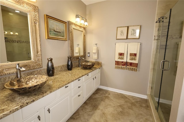 5002 Tideview Cir Unit 3, Orlando, FL 32819 - full bath featuring double vanity, a sink, baseboards, and a stall shower