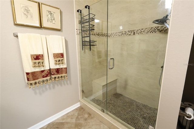 5002 Tideview Cir Unit 3, Orlando, FL 32819 - full bathroom featuring baseboards, tile patterned flooring, and a stall shower