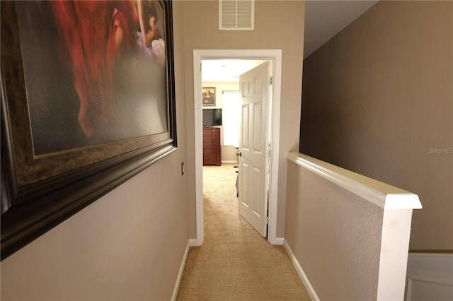 5002 Tideview Cir Unit 3, Orlando, FL 32819 - hallway featuring light colored carpet, baseboards, and visible vents