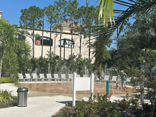 5002 Tideview Cir Unit 3, Orlando, FL 32819 - surrounding community featuring fence and a pergola
