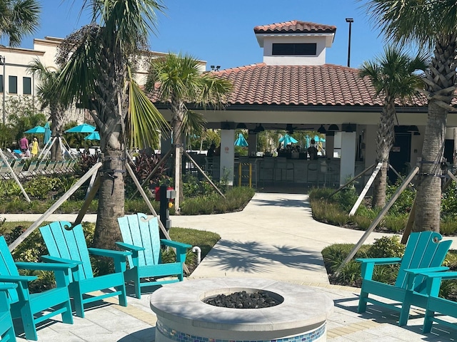 5002 Tideview Cir Unit 3, Orlando, FL 32819 - surrounding community featuring a patio, a fire pit, and a gazebo