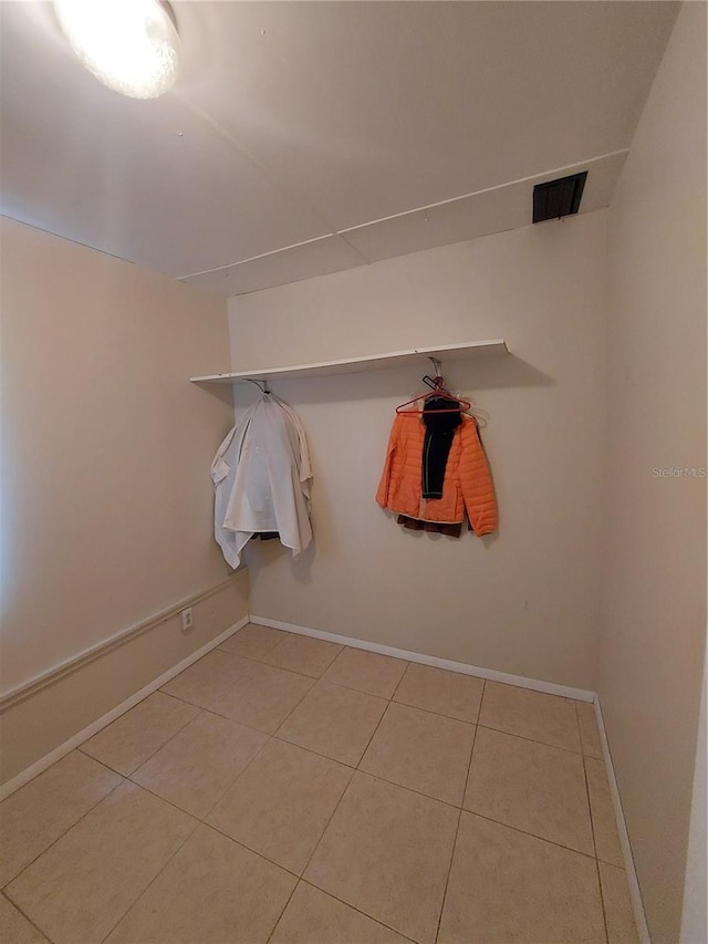 bathroom with tile patterned flooring