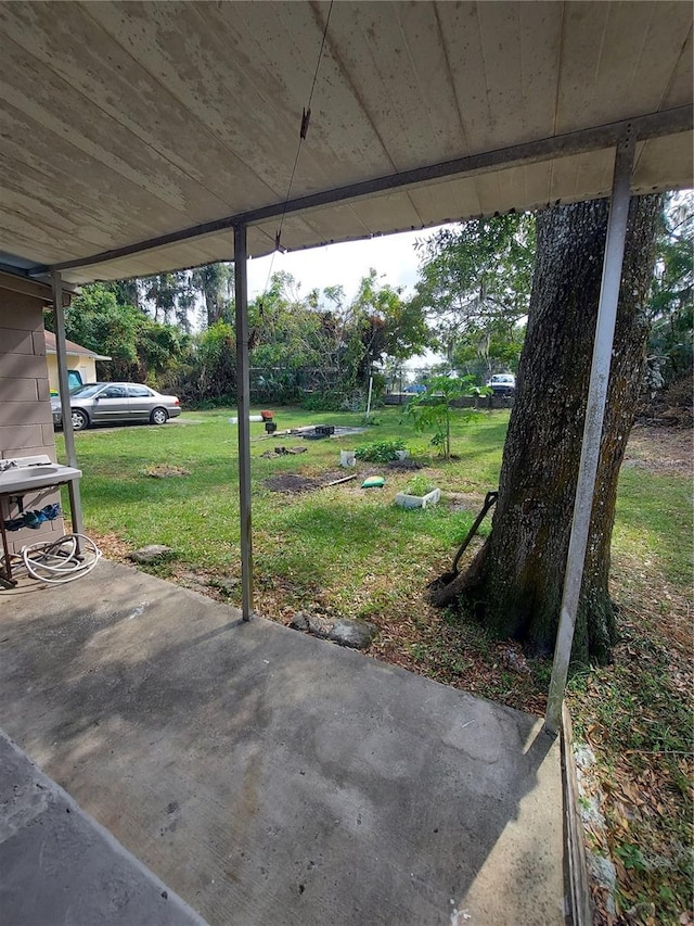 view of patio / terrace with a carport