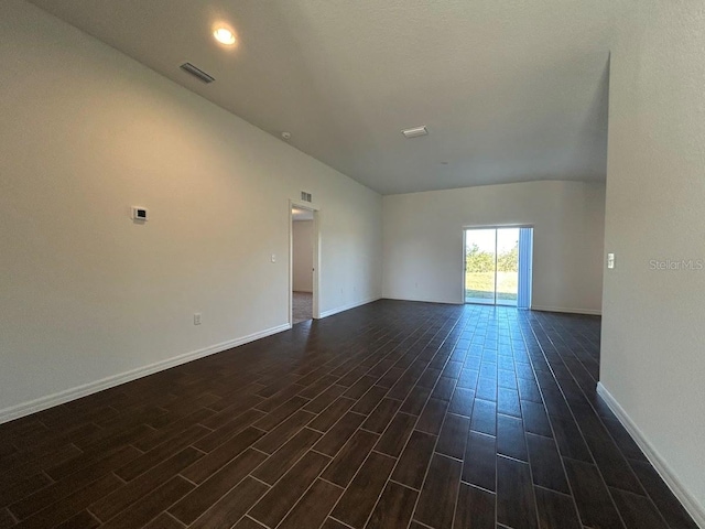 empty room featuring dark hardwood / wood-style floors