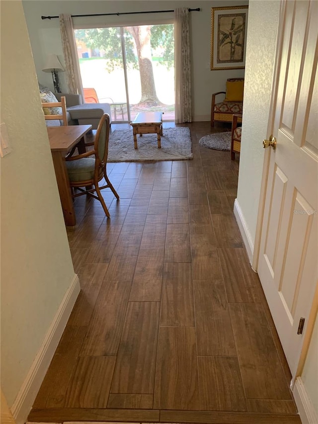 hall featuring wood-type flooring