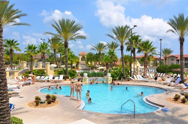 view of swimming pool with a patio area