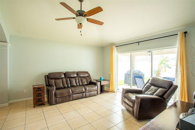 tiled living room with ceiling fan