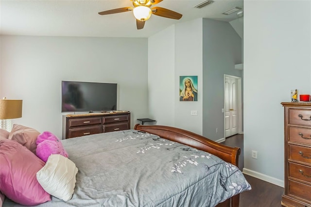 bedroom featuring dark hardwood / wood-style flooring, lofted ceiling, and ceiling fan