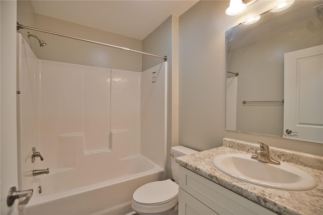 full bathroom with toilet, vanity, and  shower combination