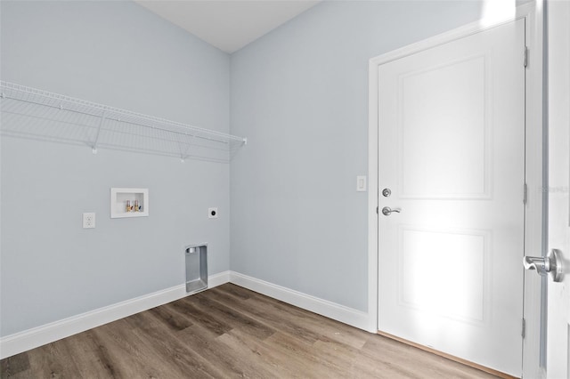 laundry area with hardwood / wood-style floors, hookup for an electric dryer, and washer hookup