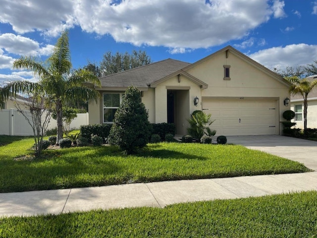 single story home with a garage and a front yard