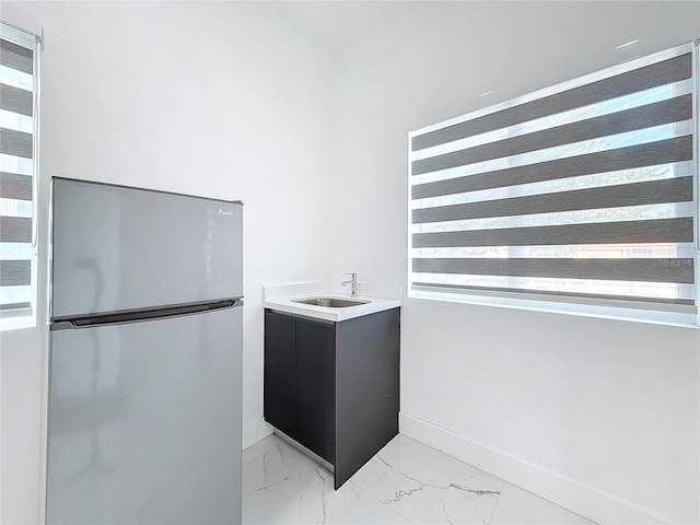 interior space featuring plenty of natural light and vanity