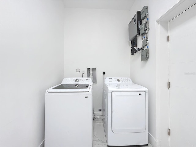 laundry room with washer and dryer