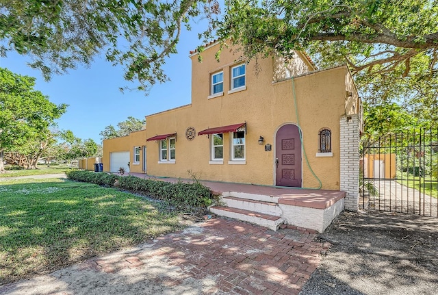 view of front of home with a front yard