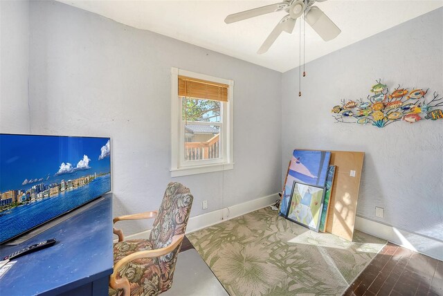 office area with ceiling fan and hardwood / wood-style floors