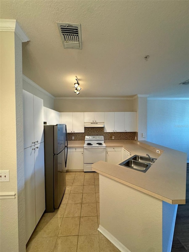 kitchen with kitchen peninsula, stainless steel fridge, white electric range oven, sink, and white cabinets