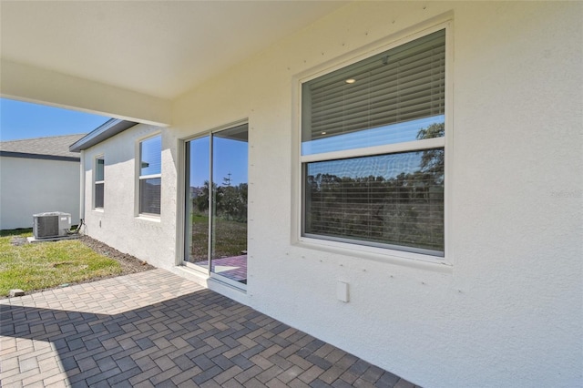 view of patio with central AC